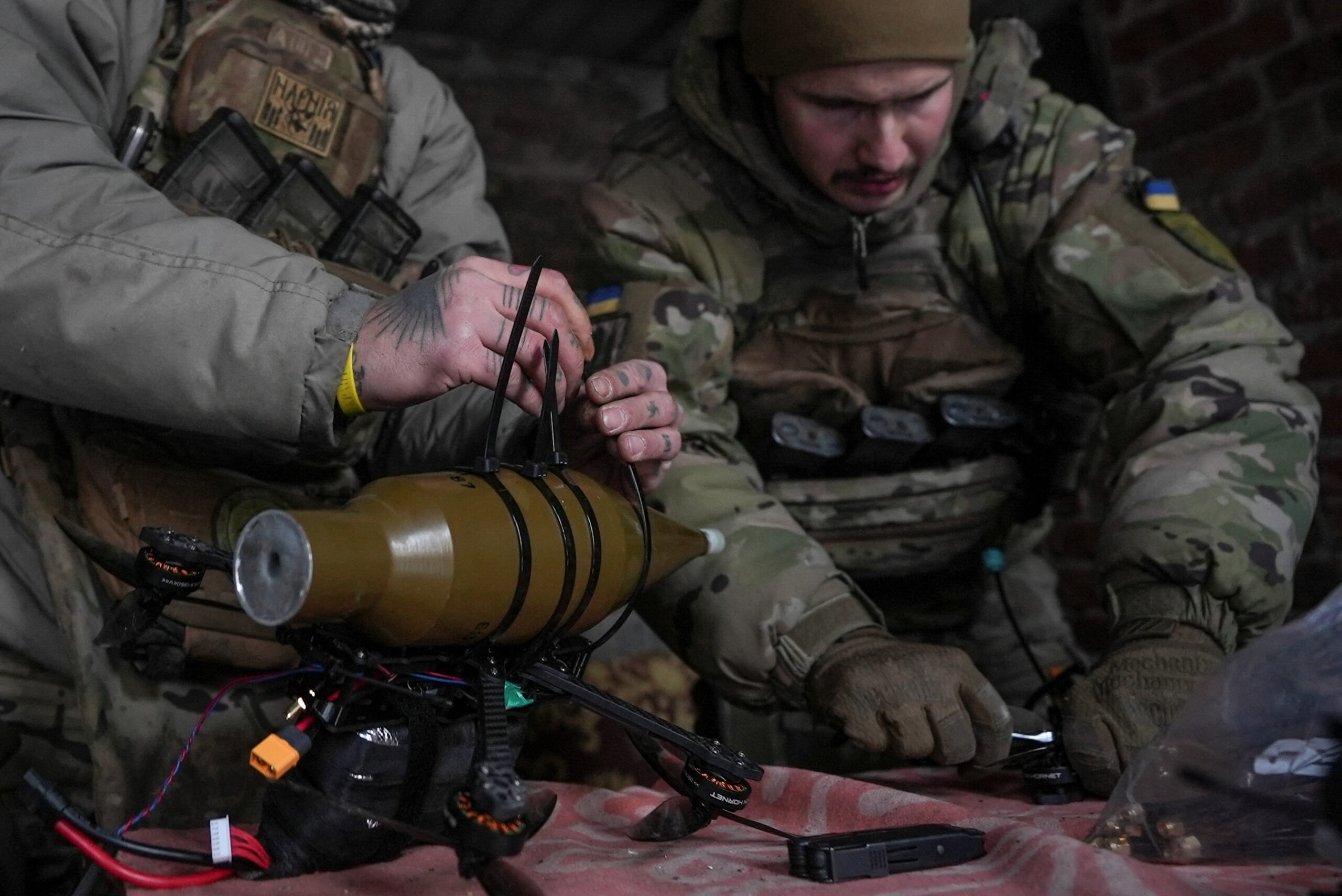 Ukrainian servicemen prepare first person view (FPV) drones at a position near the town of Horlivka